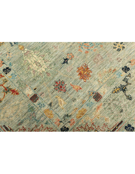 Shahi Fine wool rug from Pakistan. Stylized floral design on an aqua background, vintage effect. Perfect for elegant and traditi