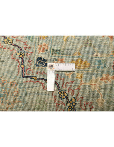 Shahi Fine wool rug from Pakistan. Stylized floral design on an aqua background, vintage effect. Perfect for elegant and traditi