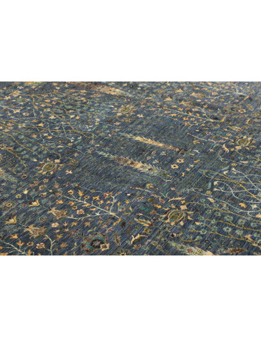 Shahi Fine Pakistan hand-carded wool rug. All-over floral design, petrol blue, gold and green, with abrash effect. Artisan quali
