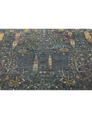 Shahi Fine Pakistan hand-carded wool rug. All-over floral design, petrol blue, gold and green, with abrash effect. Artisan quali