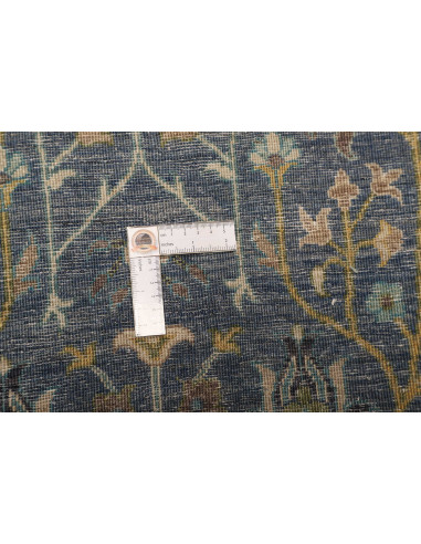Shahi Fine Pakistan hand-carded wool rug. All-over floral design, petrol blue, gold and green, with abrash effect. Artisan quali