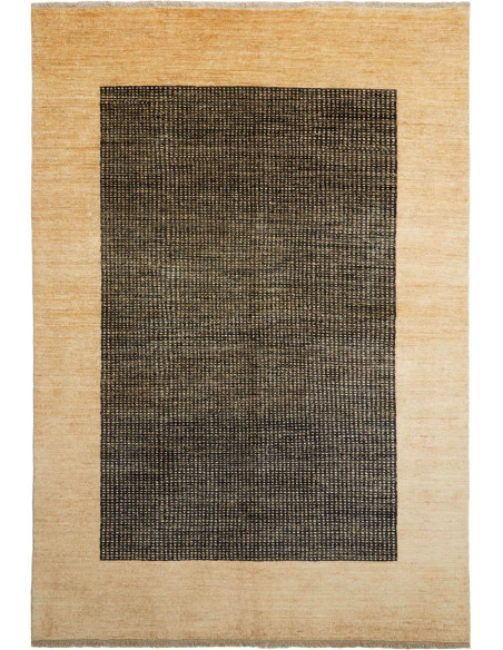 Shayan Pakistani hand-carded wool rug. Geometric black and sand design, vibrant texture. Ideal for modern and minimalist spaces.