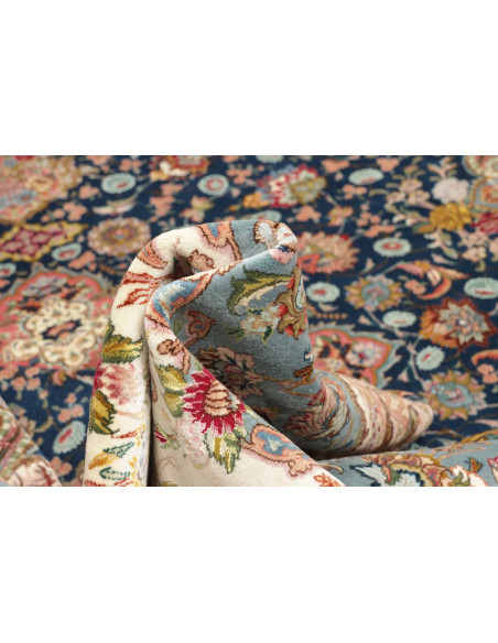 Classic Persian Tabriz 70 Raj rug. Floral central medallion on deep blue field, terracotta red borders. Cork wool and silk, high