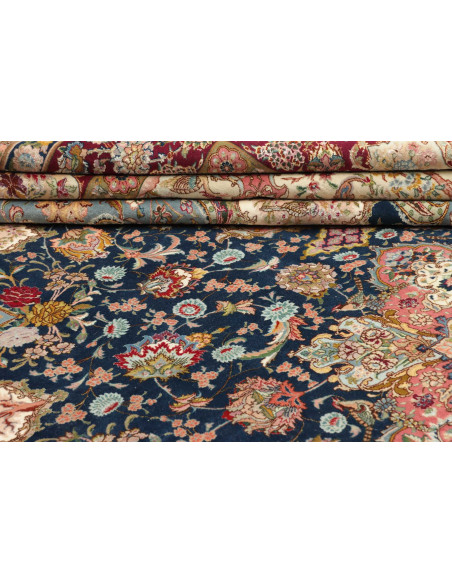 Classic Persian Tabriz 70 Raj rug. Floral central medallion on deep blue field, terracotta red borders. Cork wool and silk, high