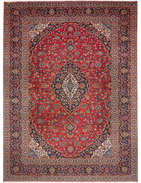 Tappeto Ardakan persiano classico con medaglione centrale e motivi floreali. Lana cardata a mano nei colori rosso, blu scuro e a