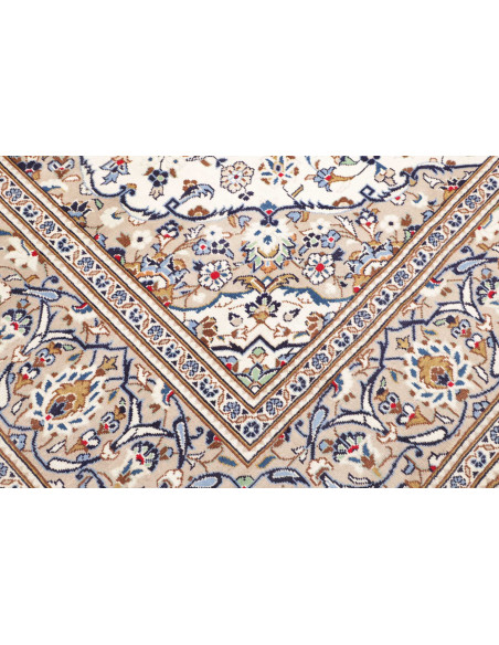 Discover this handmade Persian Kashan wool rug. Classic design with central medallion, floral motifs, cream, beige, and blue col