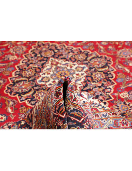 Discover the hand-knotted Persian Ardakan wool rug. Classic medallion design, red field, and floral motifs. Add timeless eleganc