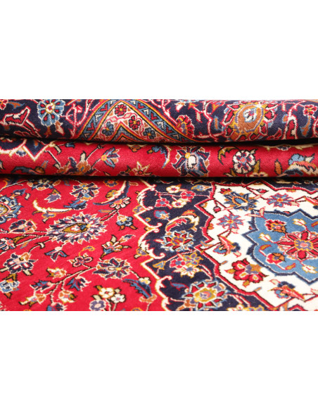 Authentic Ardakan Persian rug, hand-carded wool. Classic medallion design in red and blue. Timeless handcrafted beauty.