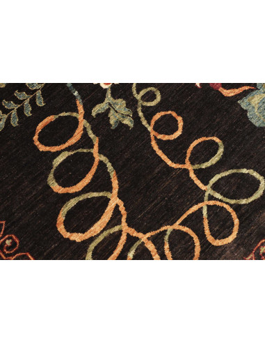 Shop the Zigler Fine rug from Pakistan. All-over floral design, black background, hand-carded wool. Classic elegance for your ho