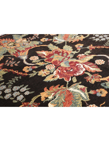Shop the Zigler Fine rug from Pakistan. All-over floral design, black background, hand-carded wool. Classic elegance for your ho