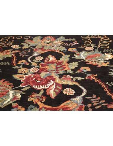 Shop the Zigler Fine rug from Pakistan. All-over floral design, black background, hand-carded wool. Classic elegance for your ho