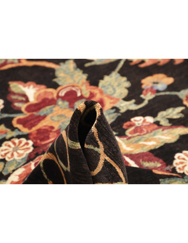 Shop the Zigler Fine rug from Pakistan. All-over floral design, black background, hand-carded wool. Classic elegance for your ho