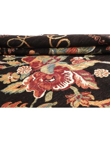 Shop the Zigler Fine rug from Pakistan. All-over floral design, black background, hand-carded wool. Classic elegance for your ho
