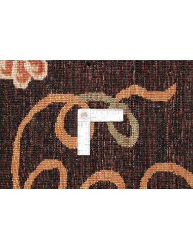 Shop the Zigler Fine rug from Pakistan. All-over floral design, black background, hand-carded wool. Classic elegance for your ho