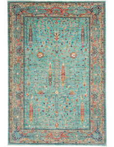 Scopri il tappeto Shahi Fine pakistano, in lana cardata a mano, con un ricco disegno floreale turchese. Eleganza e tradizione pe