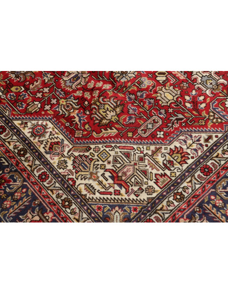 Tappeto persiano Tabriz originale. Medaglione centrale, campo rosso, bordura blu. Lana cardata a mano. Eleganza e tradizione sen