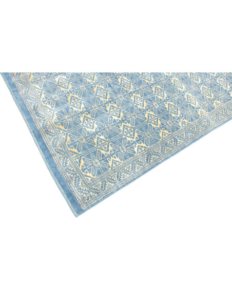 Tappeto Gabbeh Fine persiano blu e oro, in lana cardata a mano. Scopri l'eleganza tribale e la qualità artigianale per la tua ca