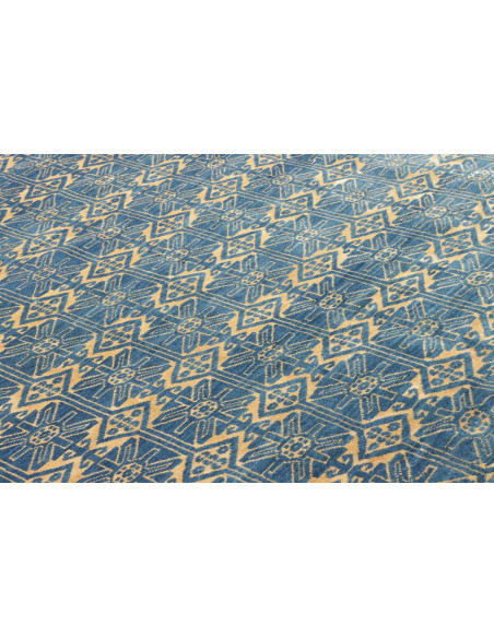 Tappeto Gabbeh Fine persiano blu e oro, in lana cardata a mano. Scopri l'eleganza tribale e la qualità artigianale per la tua ca