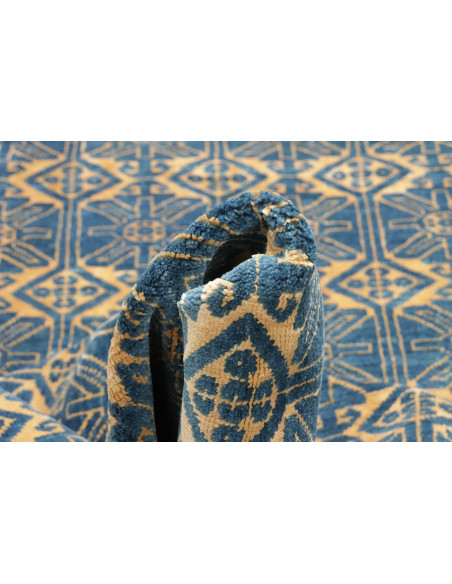 Tappeto Gabbeh Fine persiano blu e oro, in lana cardata a mano. Scopri l'eleganza tribale e la qualità artigianale per la tua ca
